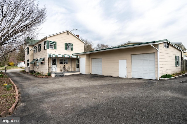traditional home featuring a garage