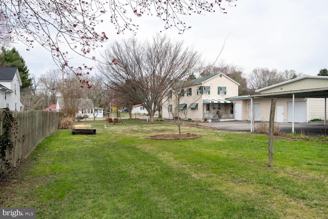 view of yard with fence