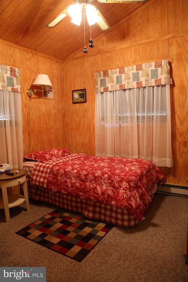 carpeted bedroom with wooden walls, wooden ceiling, and vaulted ceiling