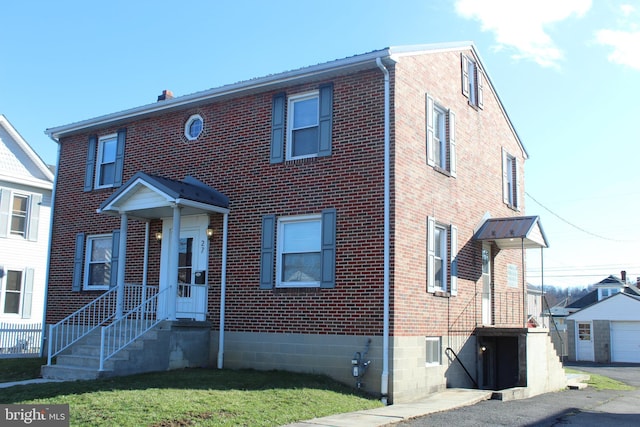 view of front of property featuring brick siding