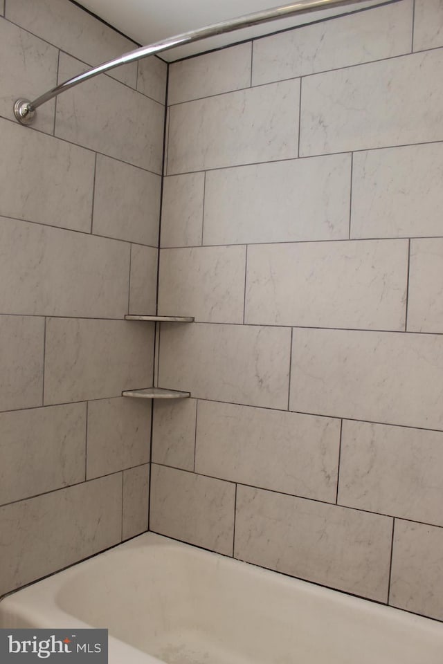 bathroom featuring bathing tub / shower combination