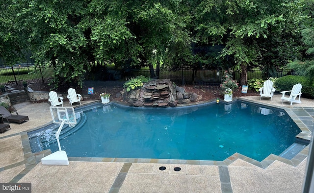view of pool with a patio, a fenced in pool, and a fenced backyard