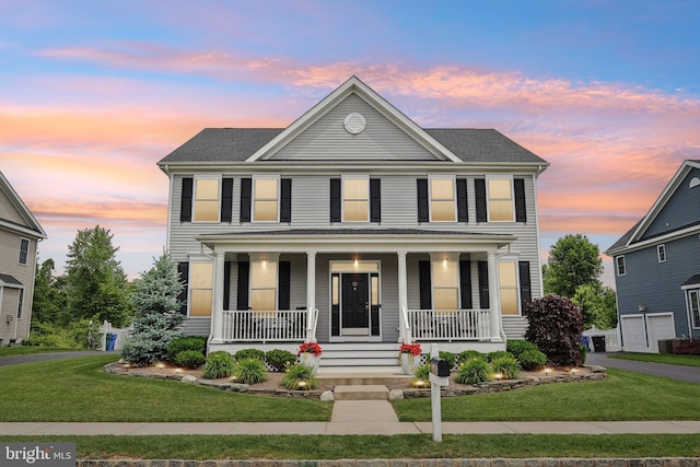 52 Olivia Way, Chesterfield, NJ 08515 - colonial inspired home with covered porch, a yard, and a shingled roof
