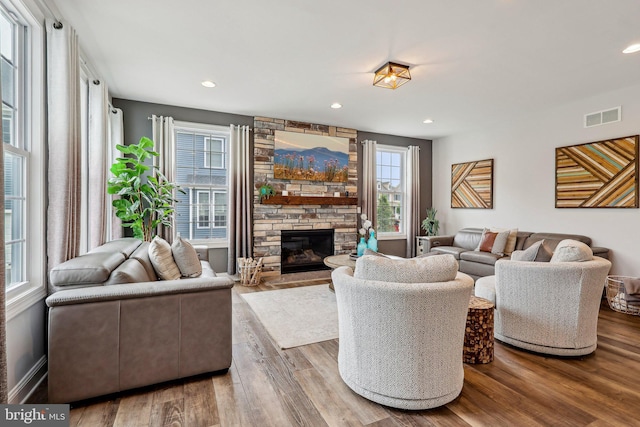 52 Olivia Way, Chesterfield, NJ 08515 - living room with a stone fireplace, wood finished floors, and recessed lighting