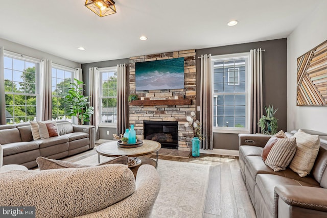 52 Olivia Way, Chesterfield, NJ 08515 - living room featuring hardwood / wood-style floors, recessed lighting, a fireplace, and baseboards
