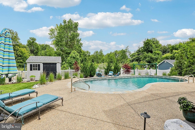 52 Olivia Way, Chesterfield, NJ 08515 - view of pool with a patio area, an outbuilding, and view of wooded area