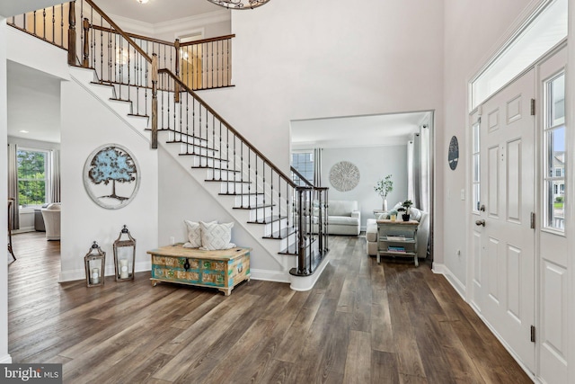 52 Olivia Way, Chesterfield, NJ 08515 - foyer entrance with a high ceiling, stairway, wood finished floors, baseboards, and ornamental molding