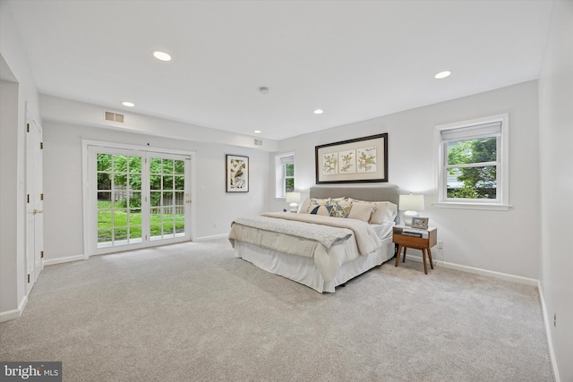1220 Wendover Rd, Bryn Mawr, PA 19010 - bedroom with carpet flooring, visible vents, and access to exterior