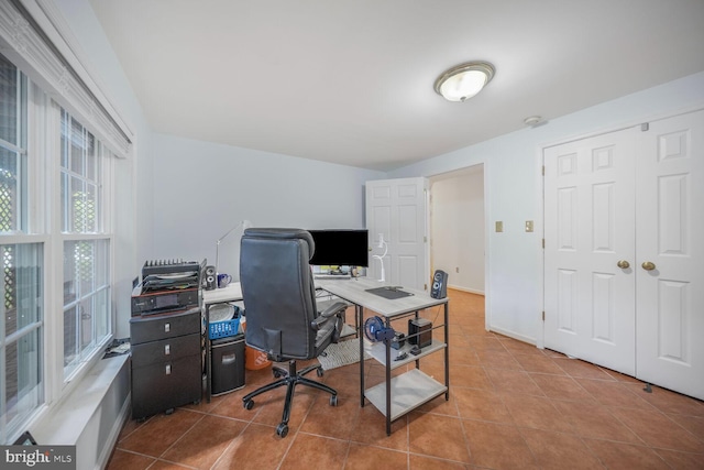 home office featuring tile patterned floors
