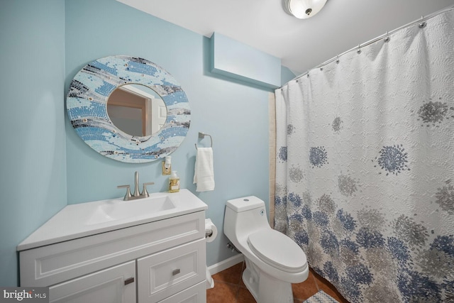 bathroom with toilet, curtained shower, tile patterned flooring, and vanity
