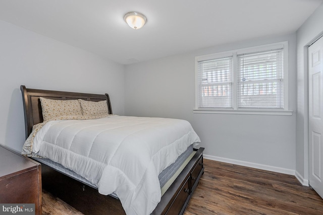 4003 25th Ave, Temple Hills, MD 20748 - bedroom with baseboards and dark wood-style flooring