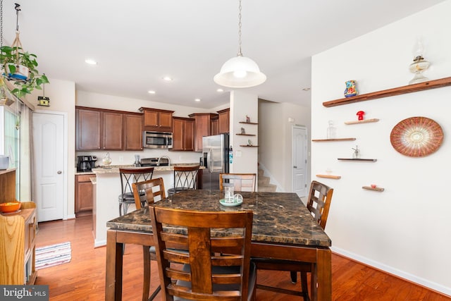 20422 Asheville Dr, Millsboro, DE 19966 - dining area featuring recessed lighting, light wood-type flooring, and baseboards