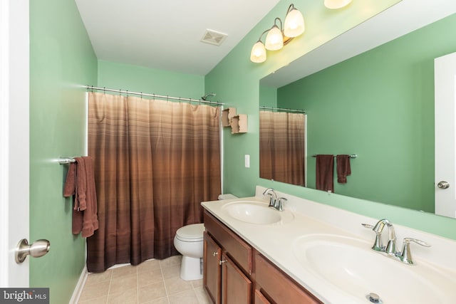 20422 Asheville Dr, Millsboro, DE 19966 - bathroom featuring a sink, visible vents, toilet, and double vanity