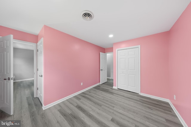 5983 Ridge Spring Cir, Salisbury, MD 21801 - unfurnished bedroom with wood finished floors, baseboards, a closet, and recessed lighting