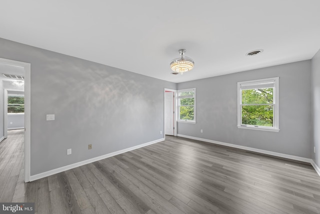 5983 Ridge Spring Cir, Salisbury, MD 21801 - spare room featuring baseboards and wood finished floors