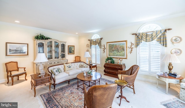 living area featuring baseboards, ornamental molding, and light carpet