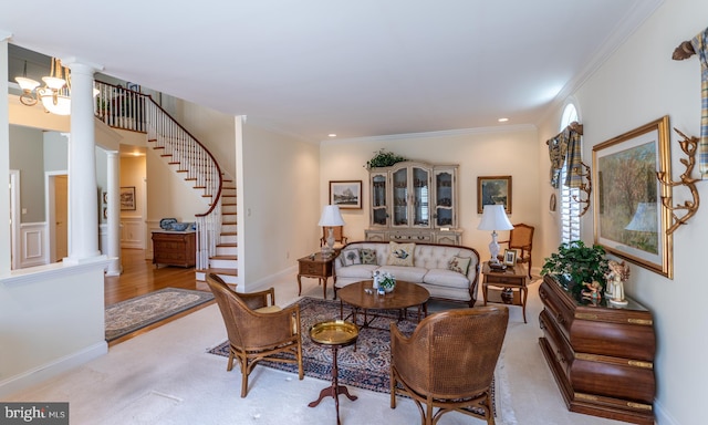living room with crown molding, stairs, baseboards, ornate columns, and recessed lighting