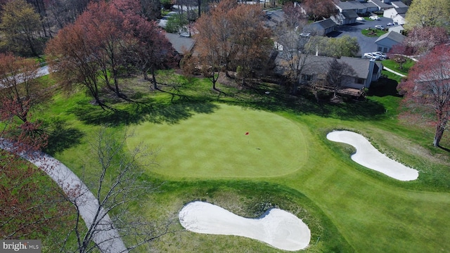 view of property's community with a residential view and golf course view