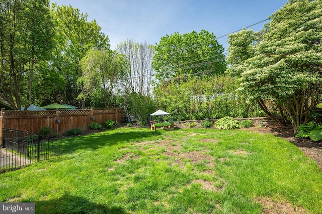 view of yard with fence