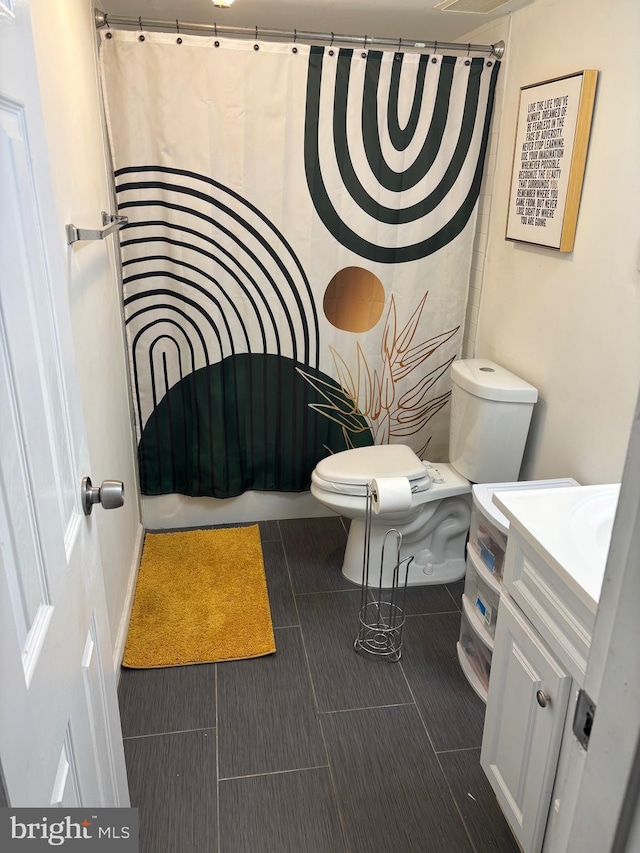 full bath with vanity and toilet