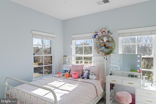 bedroom with visible vents