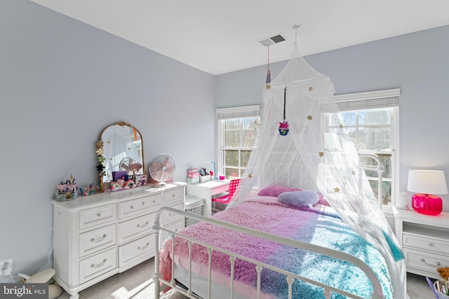 bedroom featuring visible vents and carpet floors
