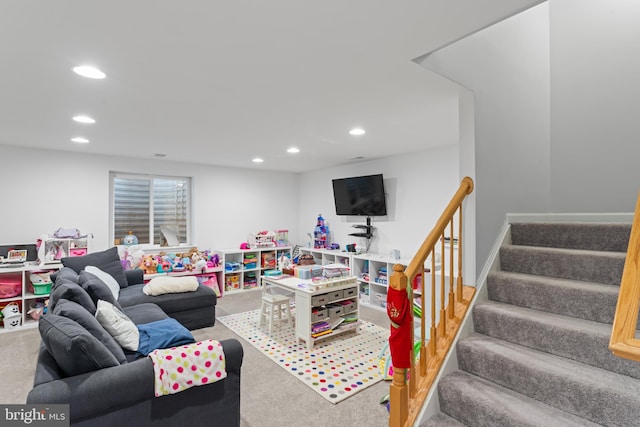 carpeted living area featuring stairs, recessed lighting, and baseboards