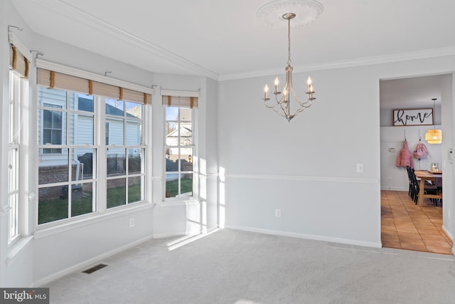 dining area featuring a notable chandelier, carpet, visible vents, and baseboards