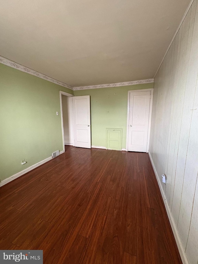 1536 E Pastorius St, Philadelphia, PA 19138 - unfurnished room featuring wood finished floors, visible vents, crown molding, and baseboards