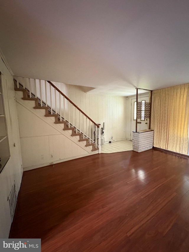 1536 E Pastorius St, Philadelphia, PA 19138 - unfurnished living room with visible vents, wood finished floors, and stairs
