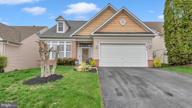 5613 Havenwood Ct, Upper Marlboro, MD 20772 - view of front of home with driveway, an attached garage, brick siding, and a front yard