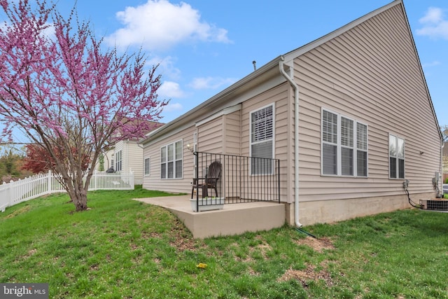 5613 Havenwood Ct, Upper Marlboro, MD 20772 - exterior space with a fenced backyard, a lawn, and a patio area
