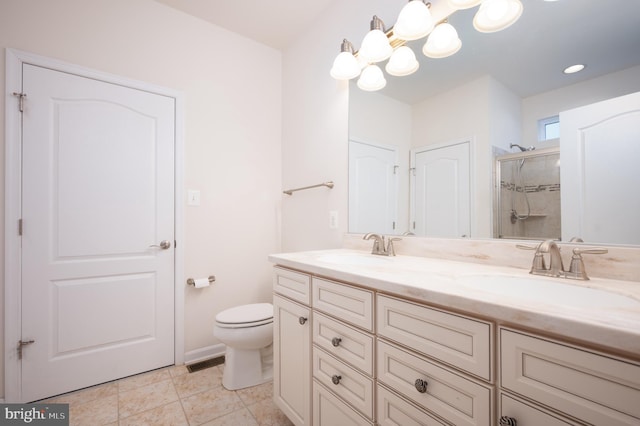 bathroom with double vanity, visible vents, a sink, and a stall shower