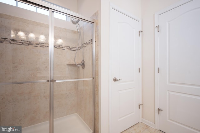 bathroom featuring a stall shower