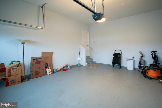 garage featuring a garage door opener