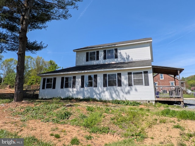view of front of house with a wooden deck
