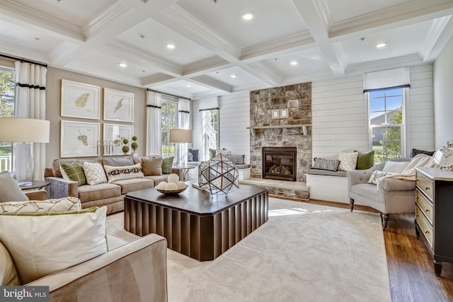 living room with a wealth of natural light, beamed ceiling, coffered ceiling, and dark wood-style flooring
