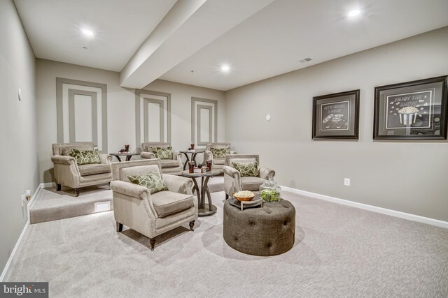 living area featuring carpet flooring, recessed lighting, and baseboards