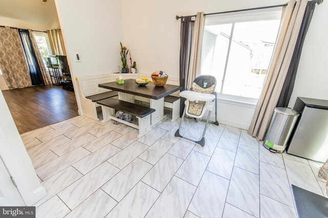 dining space with baseboards