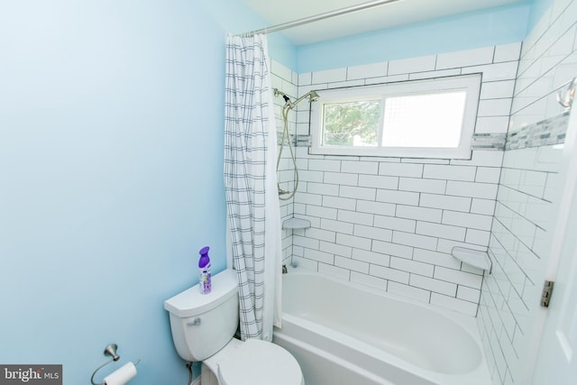 full bath with toilet and shower / bath combo with shower curtain