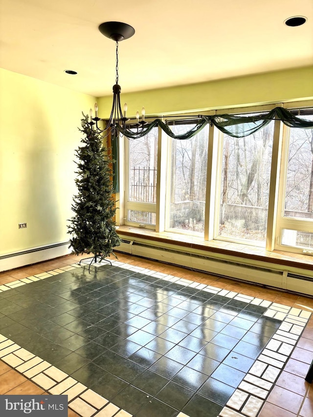 unfurnished dining area featuring a chandelier, tile patterned floors, and a baseboard radiator