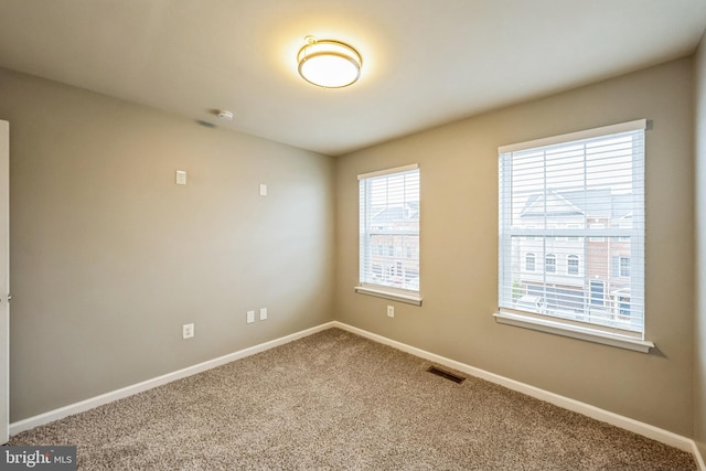 11351 Sandestin Pl, White Plains, MD 20695 - carpeted spare room with visible vents and baseboards