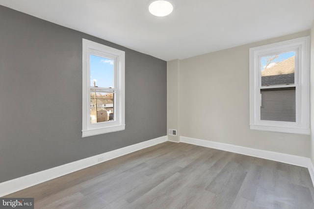 475-477 2nd St, Highspire, PA 17034 - spare room featuring visible vents, baseboards, and wood finished floors