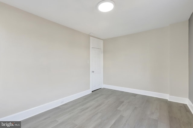 475-477 2nd St, Highspire, PA 17034 - spare room with baseboards and light wood-type flooring