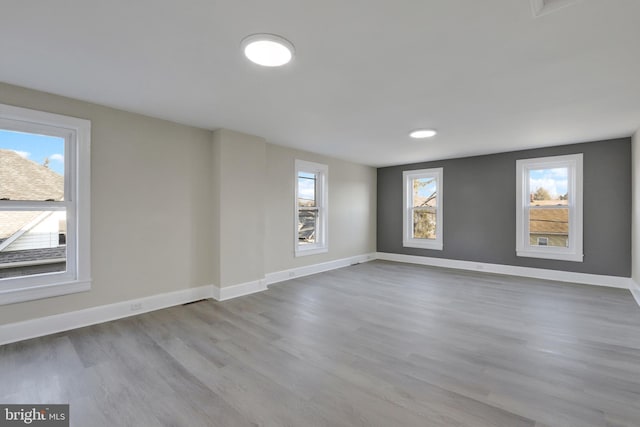 475-477 2nd St, Highspire, PA 17034 - empty room with baseboards and wood finished floors