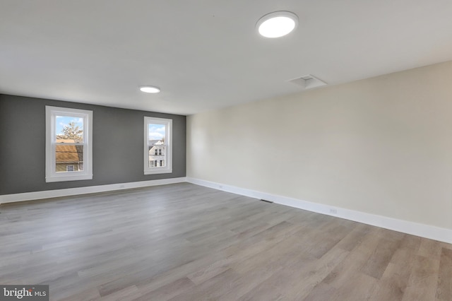 475-477 2nd St, Highspire, PA 17034 - empty room featuring baseboards and wood finished floors