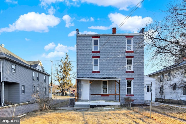 475-477 2nd St, Highspire, PA 17034 - view of front of home featuring a porch, cooling unit, fence, and a chimney