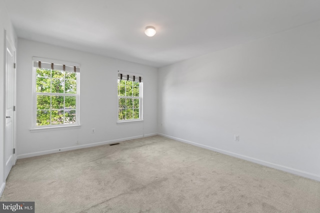 6984 Elm Ave, Elkridge, MD 21075 - unfurnished room featuring carpet flooring, baseboards, and visible vents