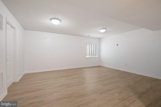 6984 Elm Ave, Elkridge, MD 21075 - spare room with baseboards and light wood-style flooring
