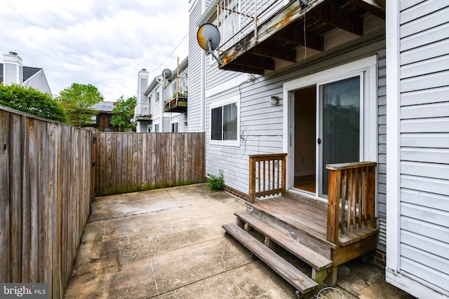 view of patio / terrace featuring fence